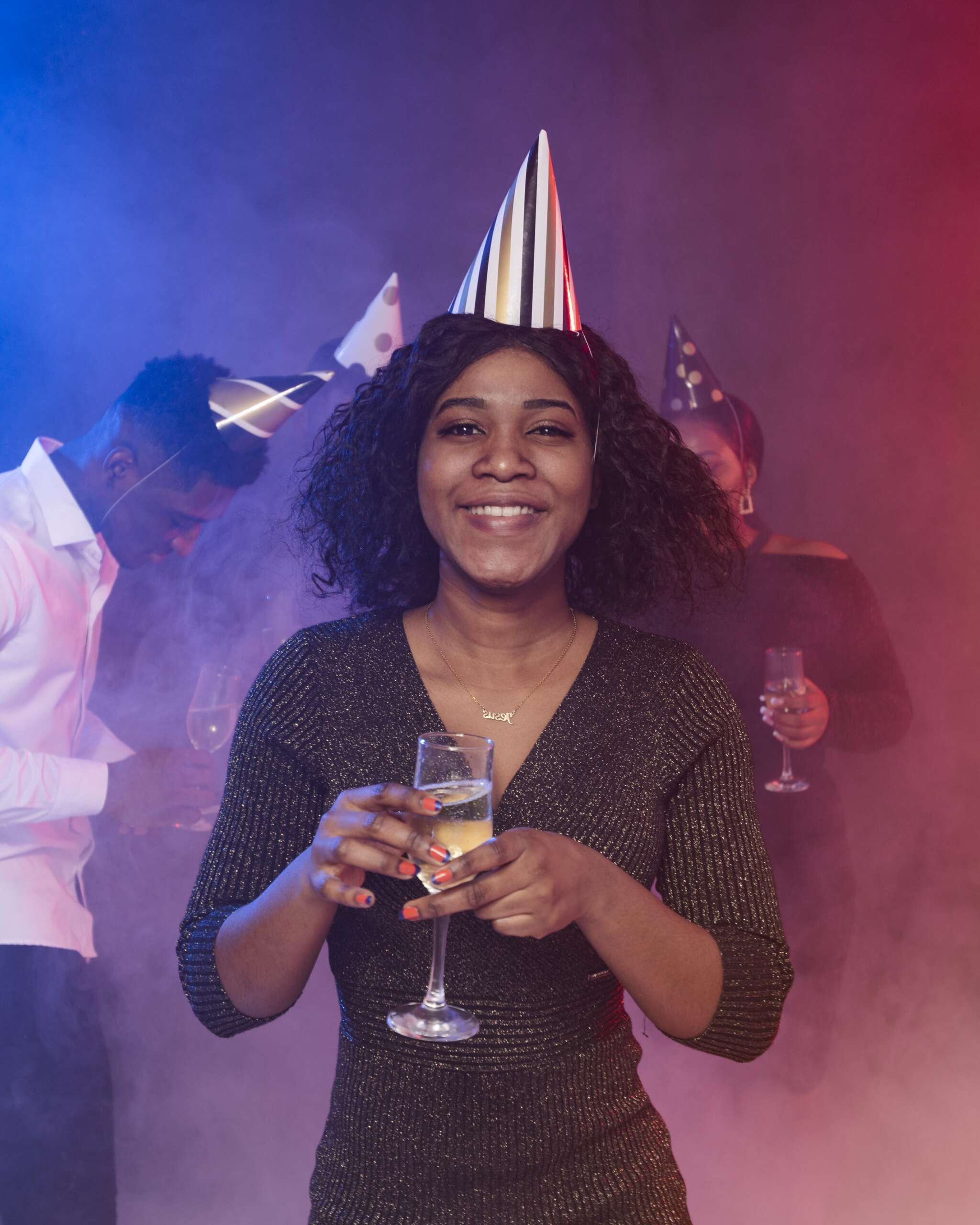 front-view-young-woman-holding-glass-champagne